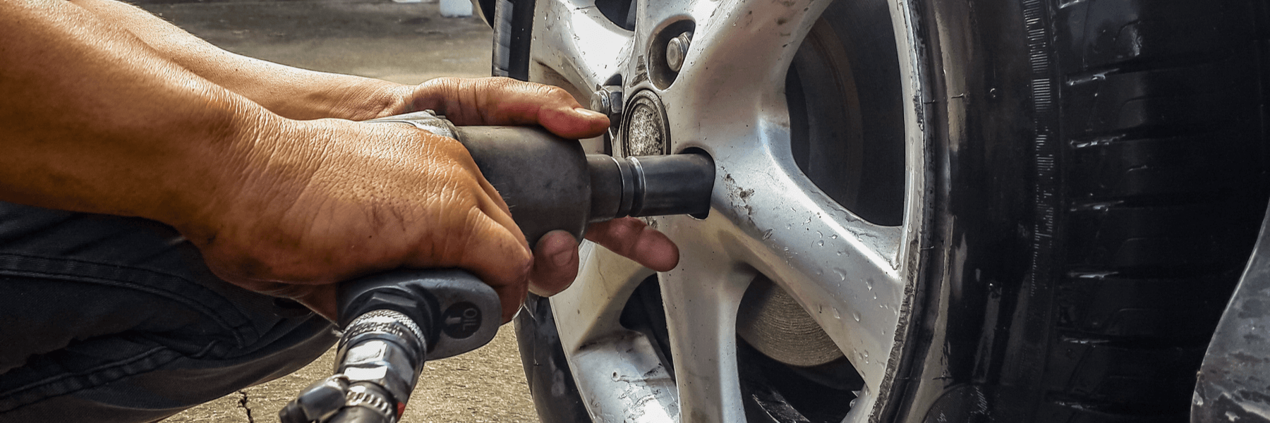 Auto mechanic rotating tires