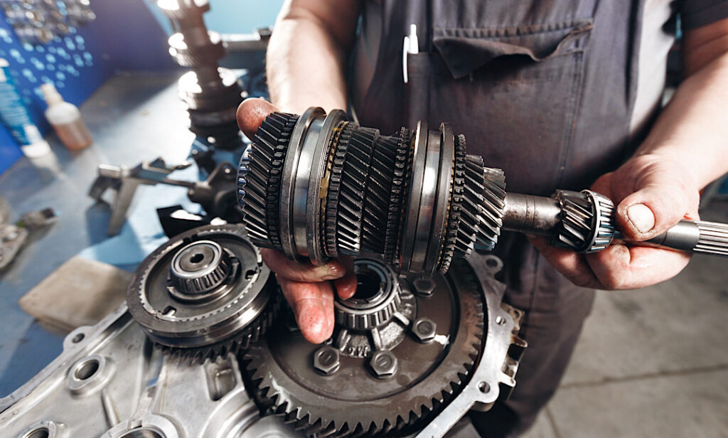 Mechanic Working on Transmission in Boise, ID
